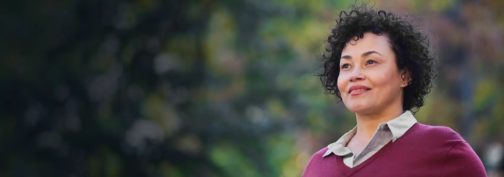 Person smiling outside